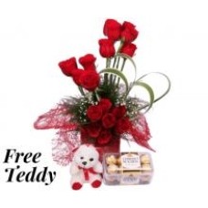 Rosas vermelhas com chocolates Ferrero Rocher e um ursinho de pelúcia grátis.