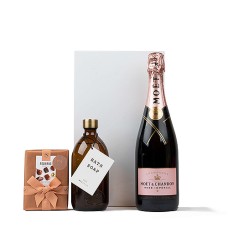 Champanhe Moët Rosé, sabonete líquido Wellmark e chocolates Neuhaus.