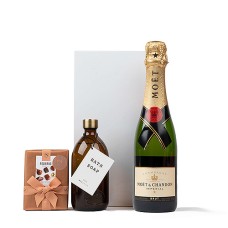 Champanhe Moët, sabonete líquido Wellmark e chocolates Neuhaus