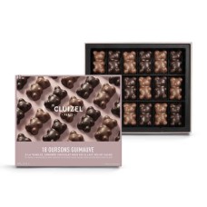 Caixa com 18 ursinhos de marshmallow Cluizel nas cores preto e leite.