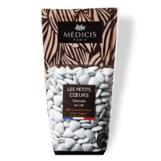 Pequenas drágeas brancas em formato de coração, cobertas com chocolate ao leite (pacote de 250g)